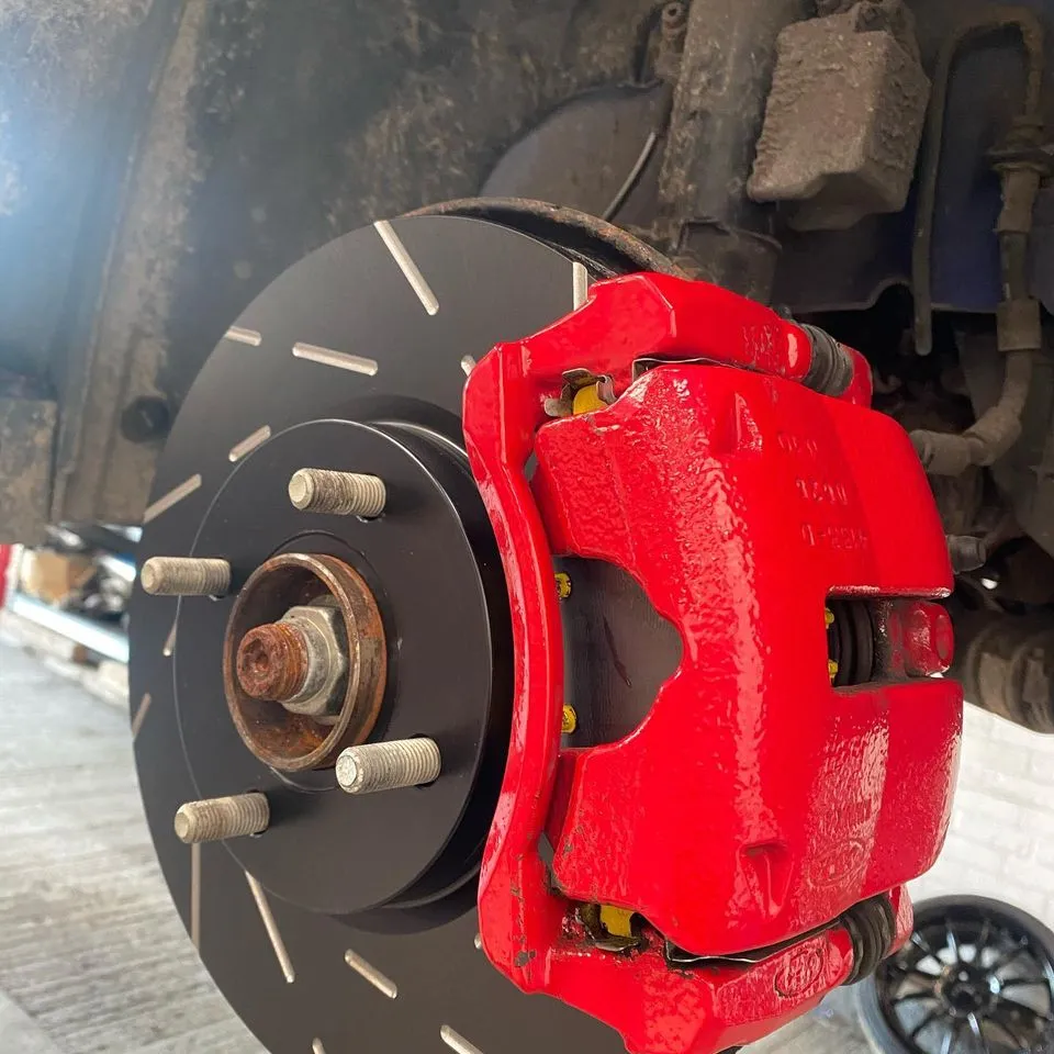 New brake disc and red caliper fitted by CJ Performance Mansfield